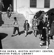 Photo of students in front of school. PICA 26543, Austin History Center, Austin Public Library.