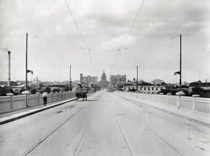 Photograph on the Congress Avenue Bridge looking north toward the Capitol