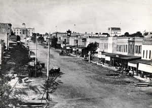 Photograph of Congress Avenue with 1853 Capitol Building in distance